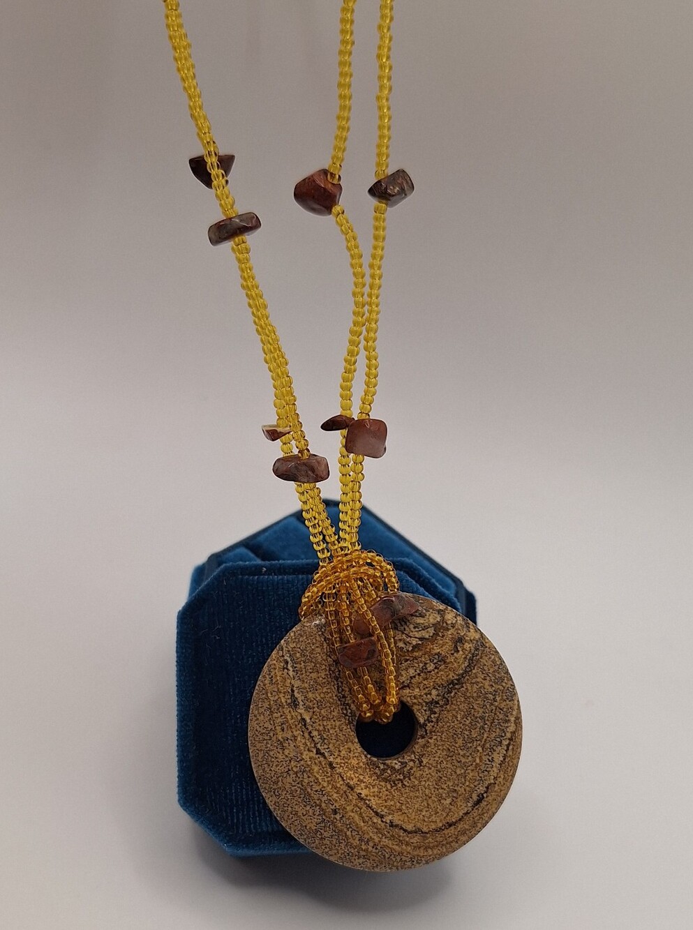 Handcrafted Brown Stone Donut Pendant Necklace with Gold Beaded Cord